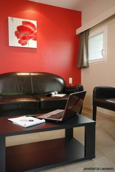 Hotel Grand Confort Le Moulin Rouge Terrasson Zimmer foto